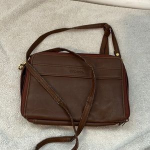 A faux leather brown capezia bag